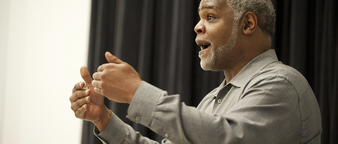 close-up of Damani Phillips teaching in class